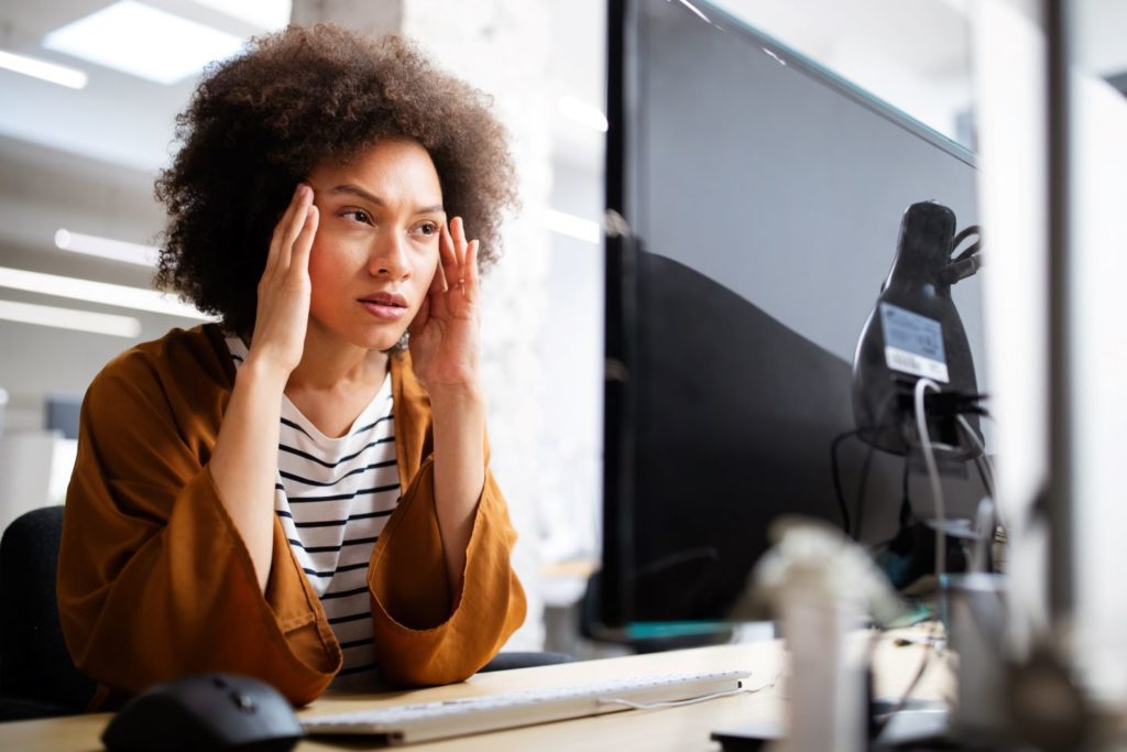 Frustrated young woman with existing CRM software